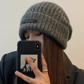 11061136